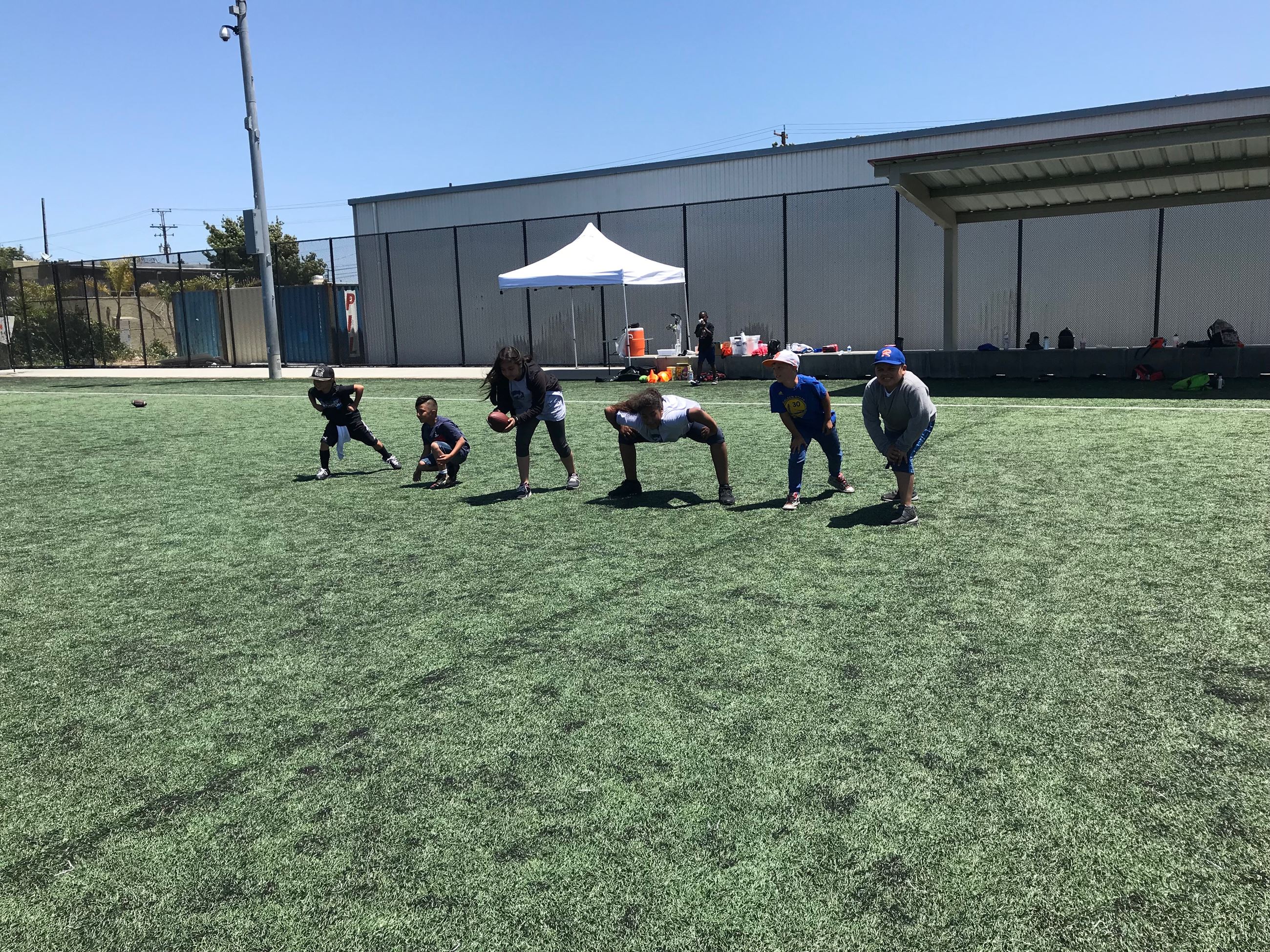 Camp participants playing Flag Football