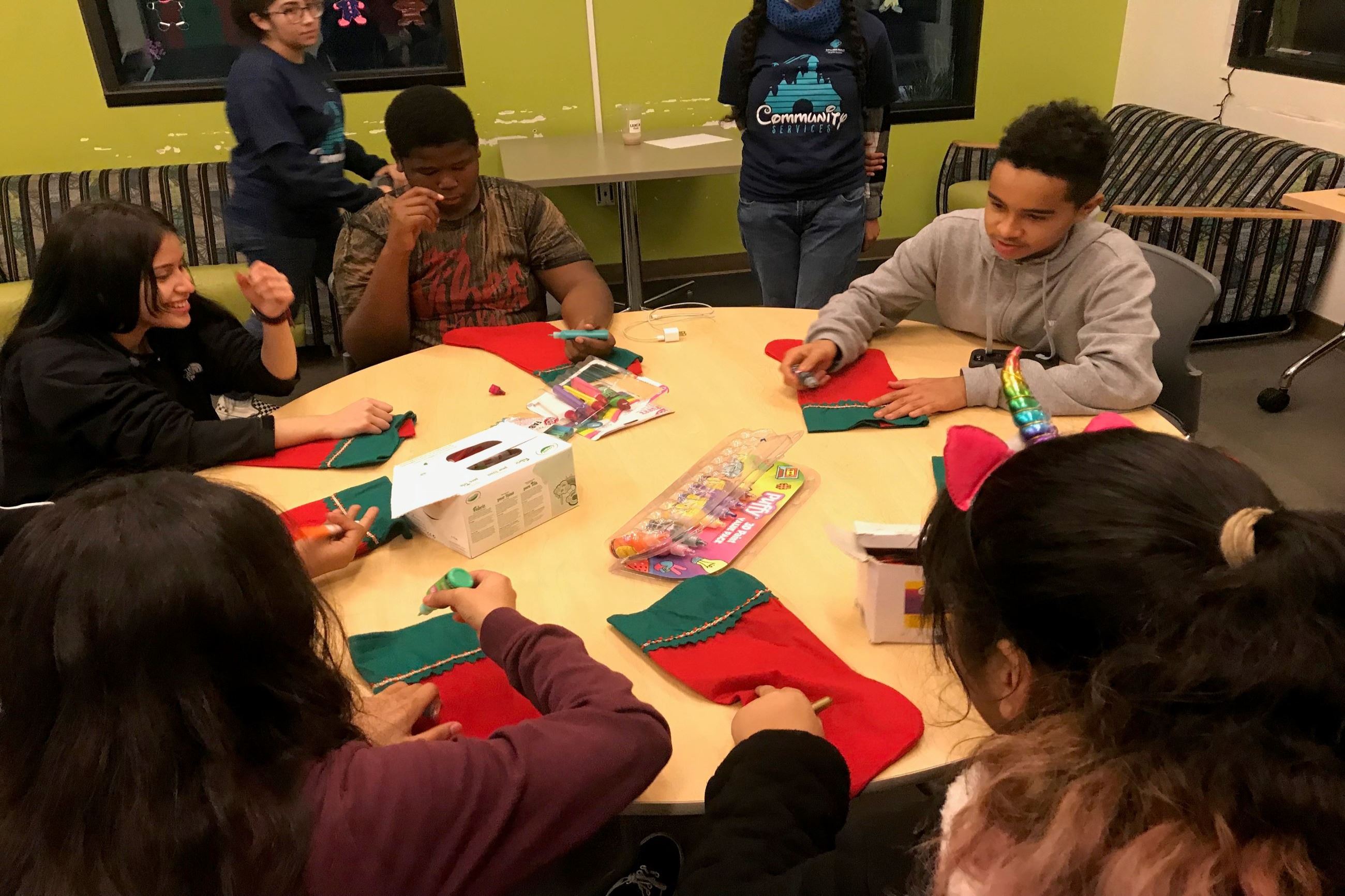 Teen Lounge Participants decorating Stockings